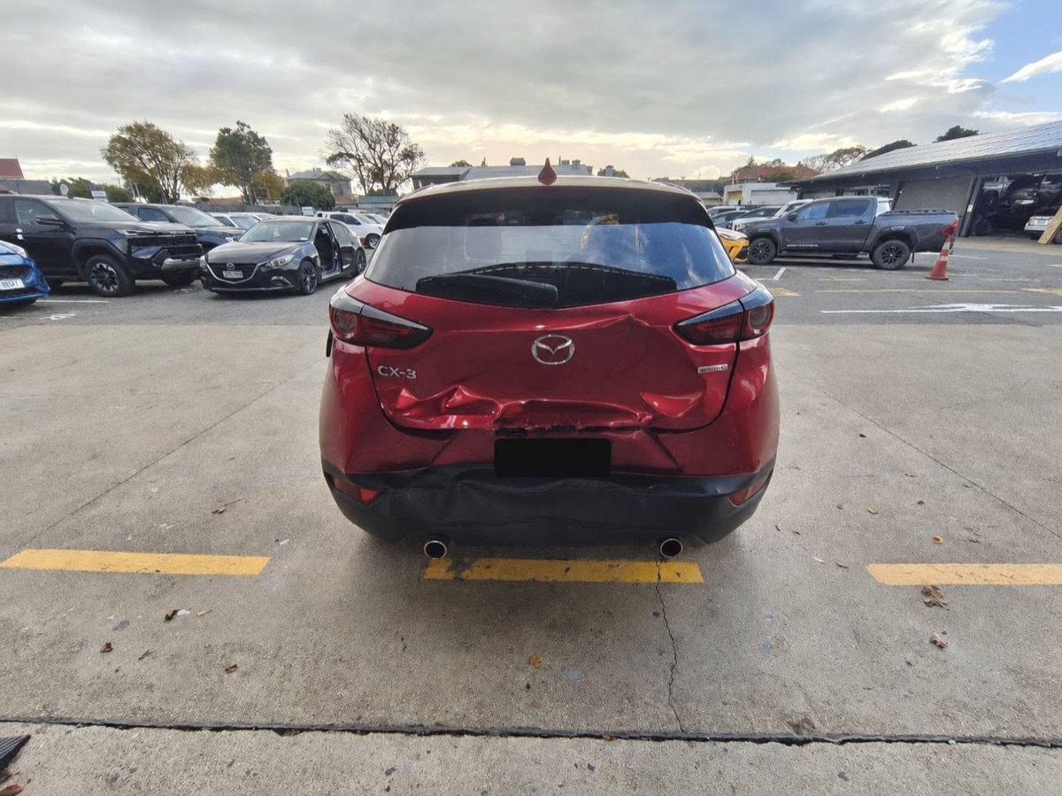 Damaged Mazda CX-3 before repair